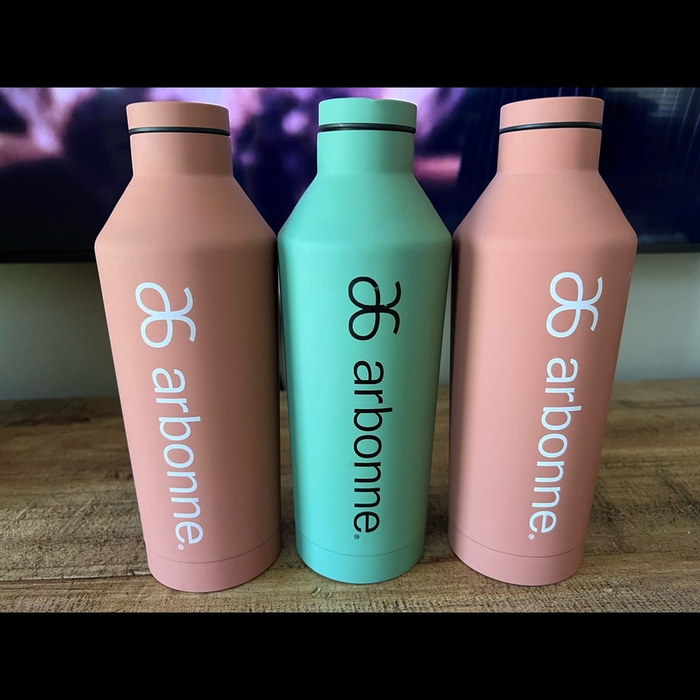 Arbonne metal water bottles 3 total - slightly used